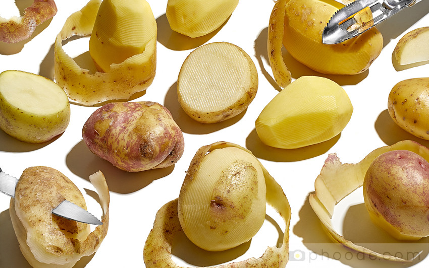 potatoes wedges, potatoes slices, potatoes peeling, potatoes peel, potatoes texture, golden yukon potatoes, half of an potatoes, potatoes abstract, potatoes and knife, potatoes cutting, potatoes cubing, potatoes colors, fall vegetable, potato variety, potato cooking, potato prep, potato dish, french fries cutting,